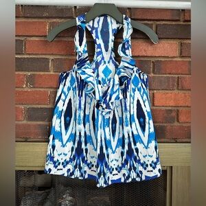 #7)  ruffles neck line and sleeveless top op. Great condition.